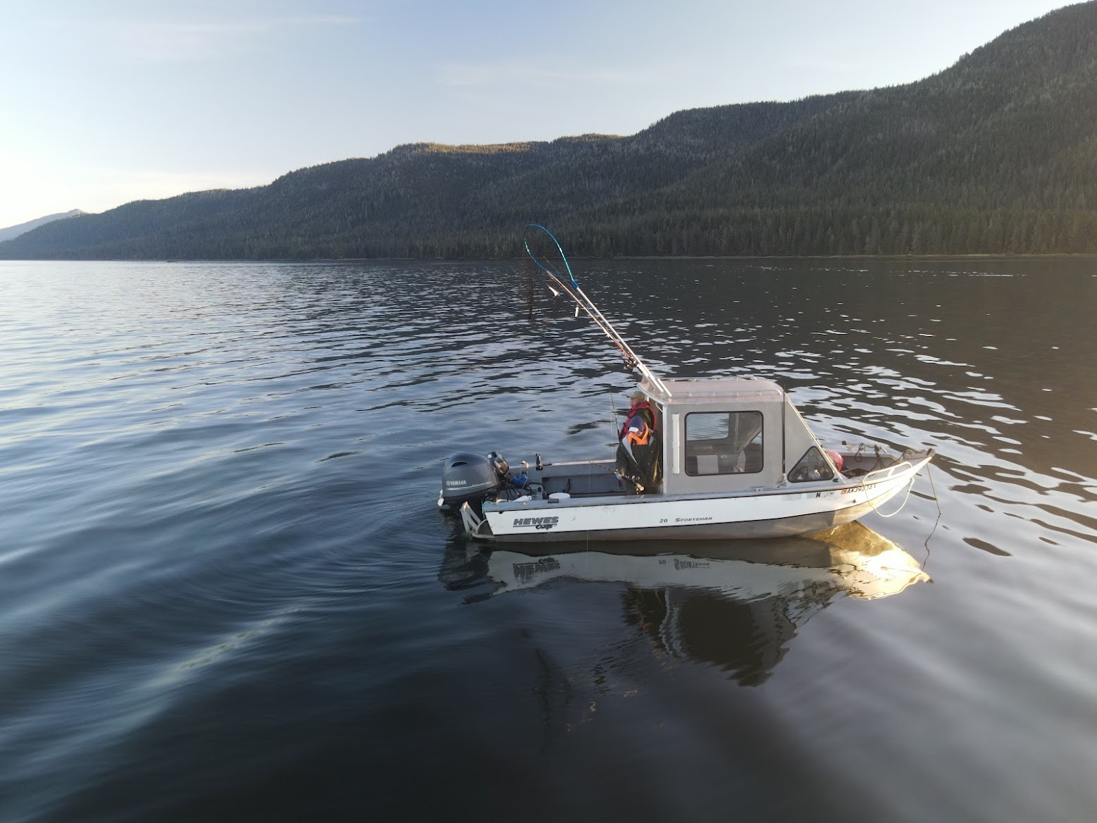 Fishing boat anchored in calm waters of Southeast Alaska